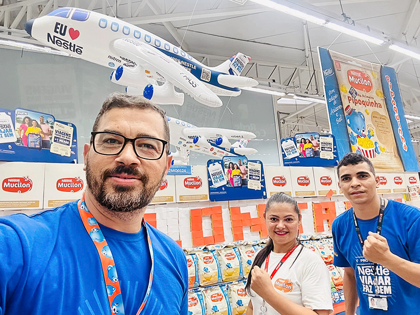Nestlé colleagues smiling together in a shop